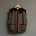 Gilet avec broderie épaule
